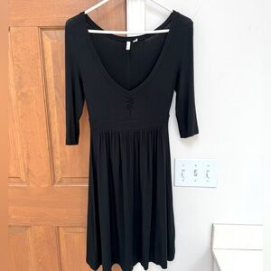 Super flattering black V-neck dress Rayon &a touch of spandex for drape and fit